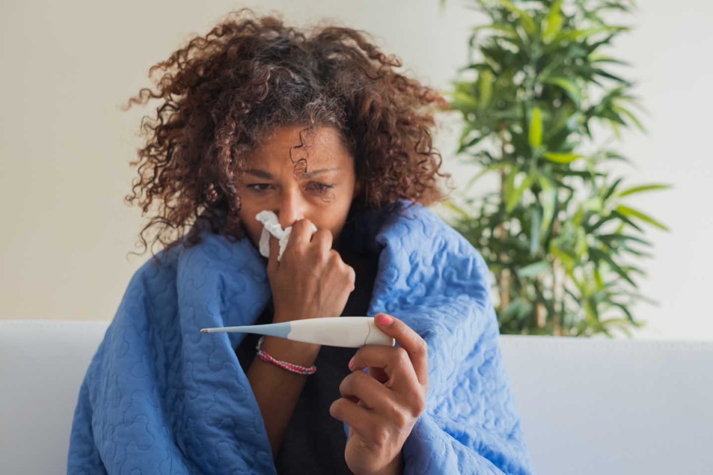 Woman suffering from the cold or the flu in Rocky Mount
